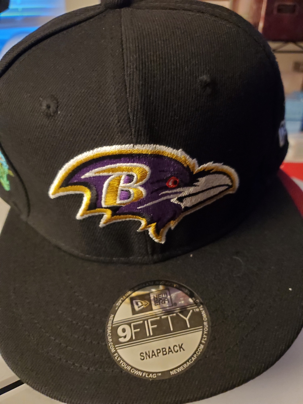 🏈 New Era Black Baltimore Ravens 9FIFTY Snapback Hat with Purple Logo 🏈